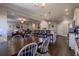 Open-concept living space with living room, dining area, and kitchen featuring an inviting design at 113 Cottage Walk, Cartersville, GA 30121