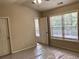 Bedroom featuring natural light, neutral walls, and closet for storage at 6158 Thorncrest Dr, Tucker, GA 30084