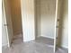 Empty closet in need of cleaning and upgrades; shelving hardware in place at 6158 Thorncrest Dr, Tucker, GA 30084