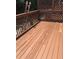 Wood deck needing stain or paint; features railings and latticework privacy screen at 6158 Thorncrest Dr, Tucker, GA 30084
