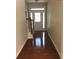 Bright foyer featuring hardwood floors, a staircase, and a door with glass inserts at 6158 Thorncrest Dr, Tucker, GA 30084
