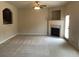 Spacious living room with a fireplace, bright doorway, and an open layout, great for entertaining at 6158 Thorncrest Dr, Tucker, GA 30084