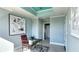 Bright office with artwork, desk, chair, and view to an ensuite bath at 2277 Peachtree Ne Rd # 507, Atlanta, GA 30309