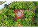 An aerial view of a new home surrounded by lush, mature trees at 1765 Harmony Rd, Temple, GA 30179