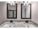 This bathroom features a double sink with granite countertops and black fixtures at 1765 Harmony Rd, Temple, GA 30179