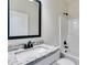 This bathroom features a vanity with a white sink and granite countertops at 1765 Harmony Rd, Temple, GA 30179