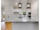 Modern kitchen featuring granite countertops and lighting at 1765 Harmony Rd, Temple, GA 30179