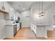 Modern kitchen featuring white cabinets, stainless steel appliances, and granite countertops at 1765 Harmony Rd, Temple, GA 30179