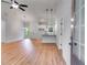 Inviting living room area features a modern kitchen and dining space with open floor concept at 1765 Harmony Rd, Temple, GA 30179