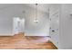 Living room featuring hardwood floors and neutral wall paint at 1765 Harmony Rd, Temple, GA 30179