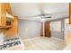 Spacious kitchen featuring tile flooring, white appliances, and light wood cabinets at 3556 Riley Rd, Douglasville, GA 30134