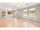 Bright living room with a view into the kitchen and tile flooring at 3556 Riley Rd, Douglasville, GA 30134
