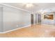 Bright living room with a view into the kitchen and tile flooring at 3556 Riley Rd, Douglasville, GA 30134