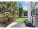 Well-maintained backyard featuring a lush lawn and mature trees at 169 Twickenham Trce, Suwanee, GA 30024