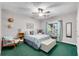 Comfortable bedroom with a ceiling fan at 169 Twickenham Trce, Suwanee, GA 30024