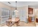 Charming breakfast nook with hardwood floors and plenty of natural light at 169 Twickenham Trce, Suwanee, GA 30024