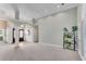 Spacious living room with a welcoming entryway and neutral color palette at 169 Twickenham Trce, Suwanee, GA 30024