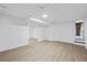 Large finished basement with light-colored floors, white trim and an open layout perfect for entertaining at 65 Indian Springs Ne Dr, Rydal, GA 30171
