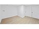 Spacious basement featuring wood-look floors and neutral walls at 65 Indian Springs Ne Dr, Rydal, GA 30171