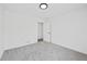 Clean bedroom with neutral carpet and a walk-in closet at 65 Indian Springs Ne Dr, Rydal, GA 30171