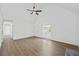 Spacious living area with hardwood floors and a large window providing natural light at 65 Indian Springs Ne Dr, Rydal, GA 30171