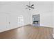 Bright living room showcasing a modern fireplace and hardwood flooring at 65 Indian Springs Ne Dr, Rydal, GA 30171