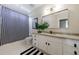 This remodeled bathroom features stylish fixtures, modern vanity and great natural light at 9105 Old Southwick Pass, Johns Creek, GA 30022
