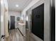 This bright laundry room features stainless steel appliances and plenty of storage at 9105 Old Southwick Pass, Johns Creek, GA 30022