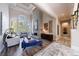 Open-concept living area featuring high ceilings, large windows, and a modern fireplace at 9105 Old Southwick Pass, Johns Creek, GA 30022