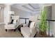 This open sitting area features two chairs and is perfect for reading or relaxation at 9105 Old Southwick Pass, Johns Creek, GA 30022