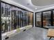 Impressive wine cellar with glass doors and ample storage at 9105 Old Southwick Pass, Johns Creek, GA 30022