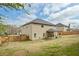 Spacious backyard featuring a covered patio and fenced yard, perfect for outdoor entertaining at 4745 Prather Farm Cir, Cumming, GA 30040