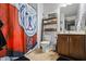 Bathroom with a fun bulldog-themed shower curtain and a rustic ladder shelf for storage at 4745 Prather Farm Cir, Cumming, GA 30040