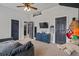 Spacious bedroom with multiple doors and fun decorations, creating a playful atmosphere at 4745 Prather Farm Cir, Cumming, GA 30040