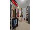 Spacious walk-in closet with custom shelving and ample storage space at 4745 Prather Farm Cir, Cumming, GA 30040