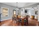 Inviting dining room that opens to living room area, creating an expansive entertaining space at 4745 Prather Farm Cir, Cumming, GA 30040