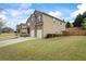 Well-maintained two-story home with brick and siding exterior, showcasing a manicured front lawn at 4745 Prather Farm Cir, Cumming, GA 30040