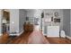 Spacious hallway with hardwood floors and access to multiple rooms at 4745 Prather Farm Cir, Cumming, GA 30040