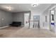 Upstairs loft space with neutral carpet and multiple entrances at 4745 Prather Farm Cir, Cumming, GA 30040