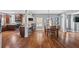 An open floorplan featuring a kitchen, dining area, and living space, all seamlessly connected at 4745 Prather Farm Cir, Cumming, GA 30040