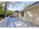 Large back deck overlooking the backyard and trees off the rear of the property at 3027 Clove Tree Ln, Woodstock, GA 30189