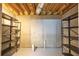 Unfinished basement with exposed insulation, concrete walls, and potential for shelving at 3027 Clove Tree Ln, Woodstock, GA 30189