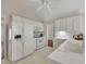 Bright kitchen with white appliances and countertops, offering a clean and functional space at 3027 Clove Tree Ln, Woodstock, GA 30189