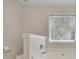A close-up of the main bathroom showing soaking tub and window at 3027 Clove Tree Ln, Woodstock, GA 30189