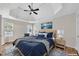 Main bedroom features a tray ceiling, natural light, and soft, neutral decor at 3027 Clove Tree Ln, Woodstock, GA 30189