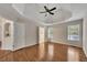 The spacious main bedroom leads into the main bathroom and has hardwood floors at 3027 Clove Tree Ln, Woodstock, GA 30189