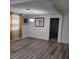 Bright dining area with new floors, modern lighting, and natural light at 3785 Somerset Sw Dr, Marietta, GA 30064