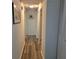 Hallway with new floors and access to rooms at 3785 Somerset Sw Dr, Marietta, GA 30064