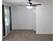 Relaxing living room with ceiling fan, carpeted floor, and ample natural light at 3785 Somerset Sw Dr, Marietta, GA 30064