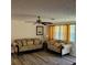Cozy living room featuring two couches, neutral tones, and updated flooring at 3785 Somerset Sw Dr, Marietta, GA 30064